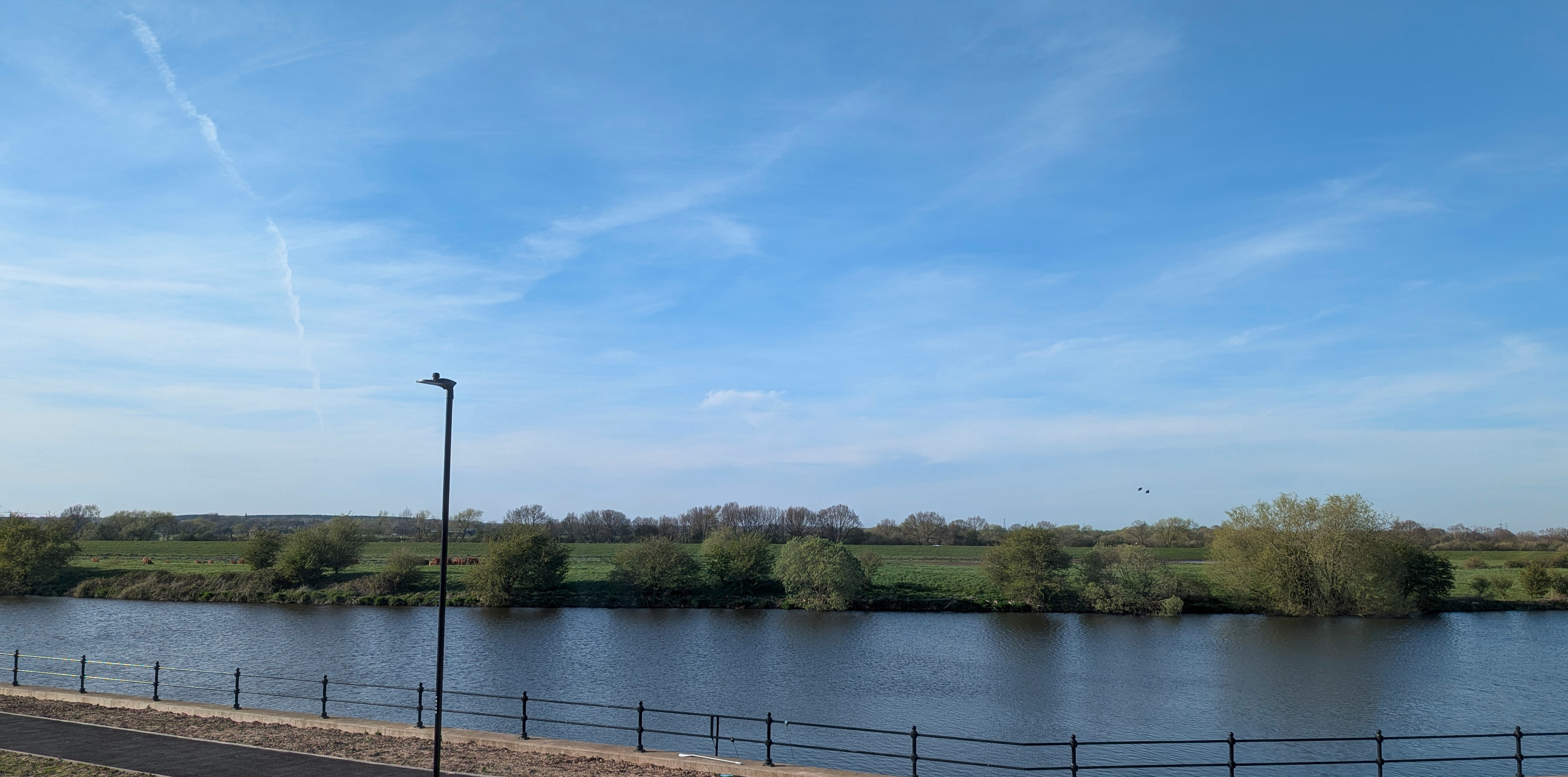 View across the water and green space at Riverdale Park